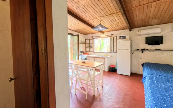 Living con el comedor y la cocina, visto desde el pasillo